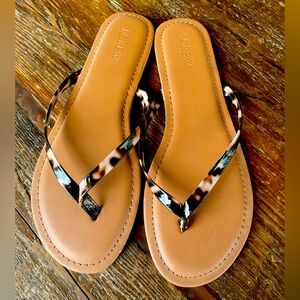 J. Crew tortoise flip flops in size 8, gently used